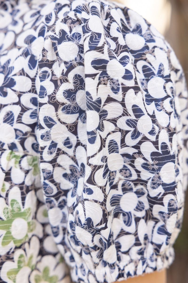 Contrasting floral embroidered tiered dress