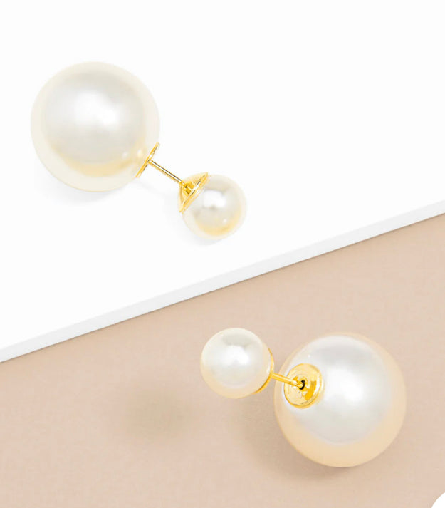 It takes two pearl earring