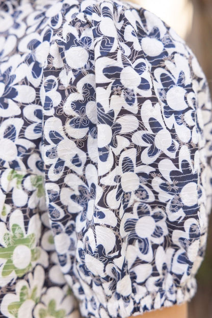 Contrasting floral embroidered tiered dress