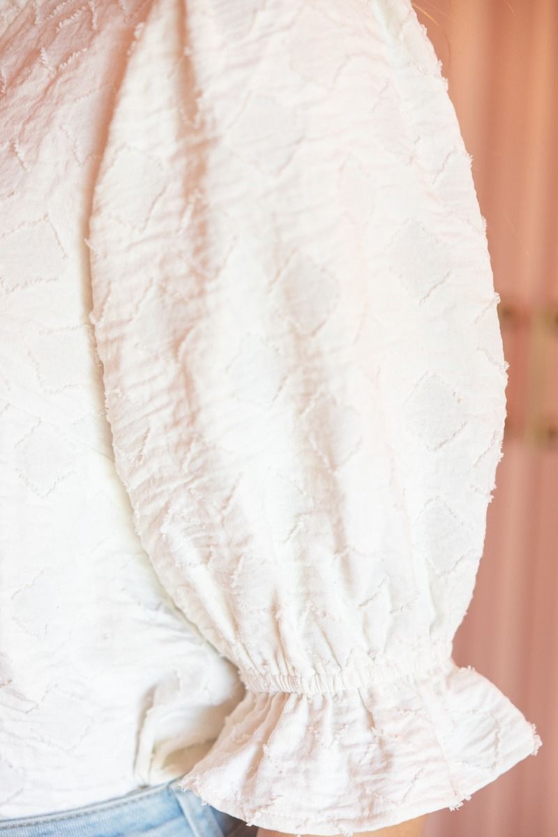 Ruffled V neck Diamond Textured Top