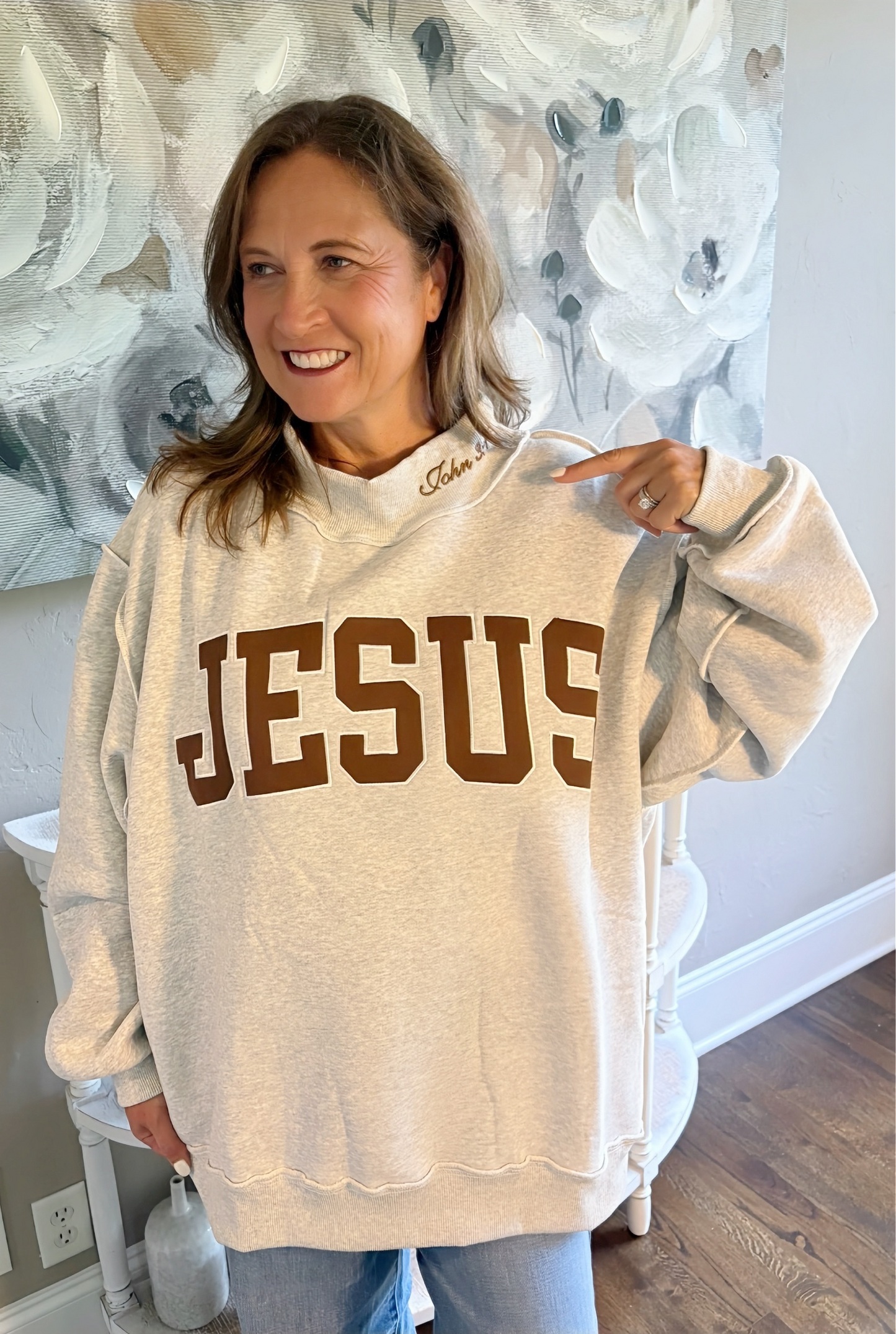 EMBROIDERED “JESUS” APPLIQUÉ MOCK-NECK SWEATSHIRT